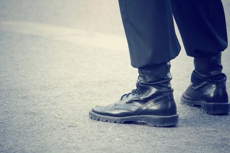 Military shoes and legsの写真素材