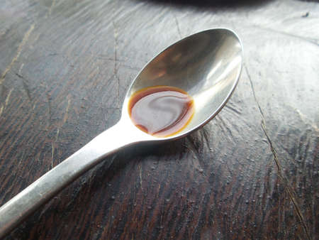 Tea spoon with coffeeの写真素材