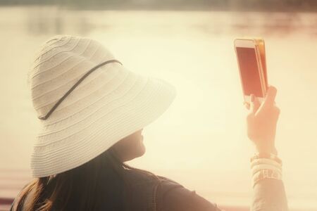 Woman take a photoの写真素材