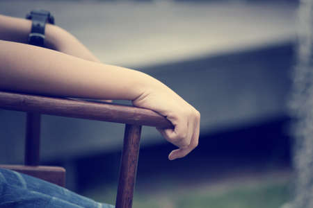 Sitting on chairの写真素材