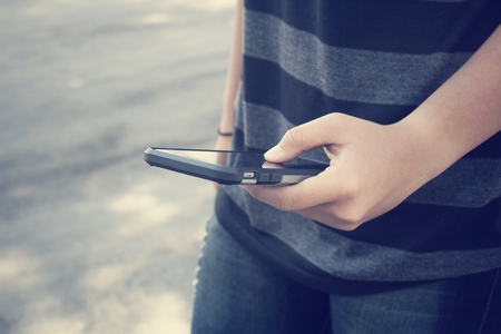 Using smart phoneの写真素材