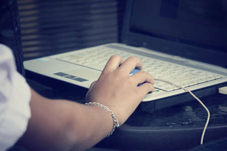 Playing computerの写真素材