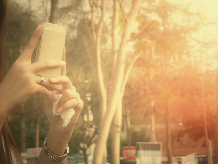 Taking photo with mobileの写真素材