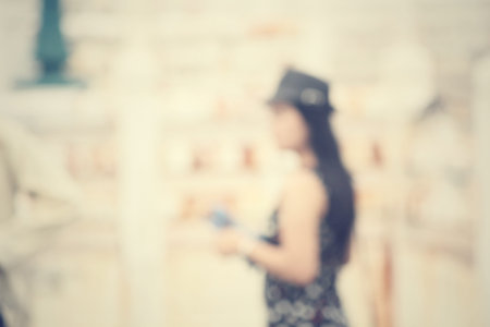 Blurred of woman with hat on summerの写真素材