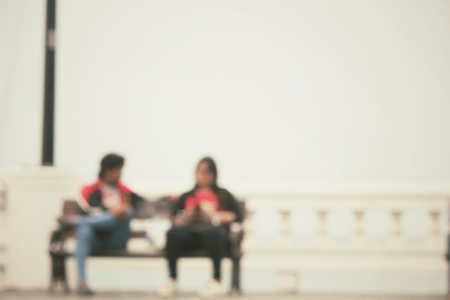 Blurred of love couple on benchの写真素材