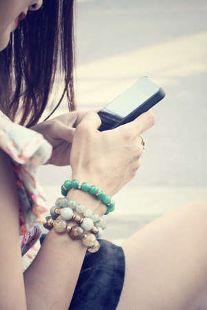 Woman using smart phoneの写真素材