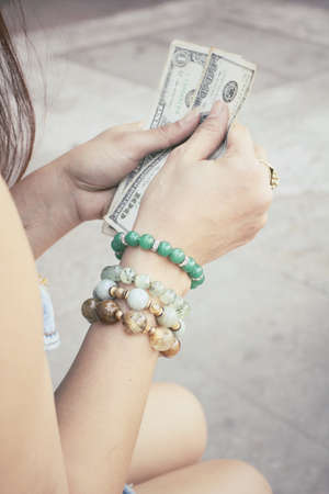 Woman with dollarsの写真素材