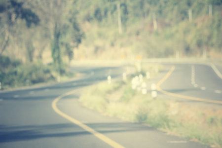 Blurred forest with road