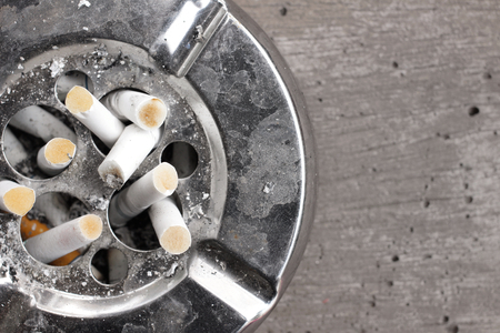 Cigarette with ashtrayの写真素材