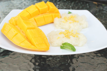 Ripe mango and sticky rice with coconut milk