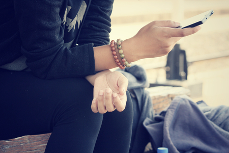 Woman using smart phoneの写真素材