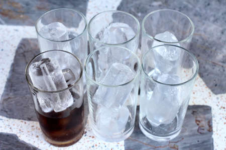 Cola with ice cubesの写真素材