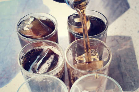 Cola with ice cubesの写真素材