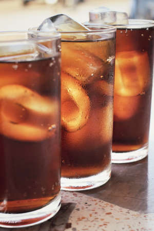 Cola with ice cubesの写真素材
