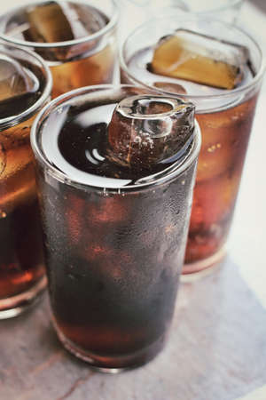 Cola with ice cubesの写真素材