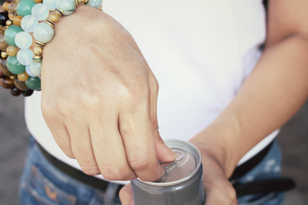 Woman drinking a cola