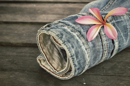Jeans with frangipani flower