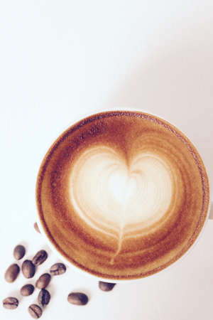 Vintage latte art coffeeの写真素材
