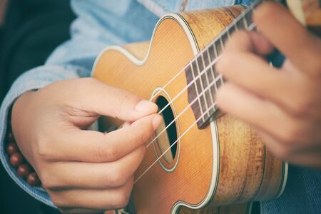 woman playing ukuleleの写真素材