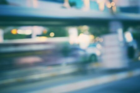 Blurred of car in city at nightの写真素材