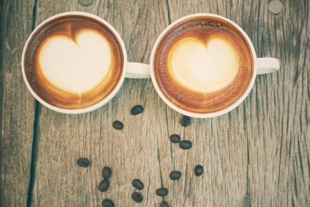 Two cups of latte art coffeeの写真素材