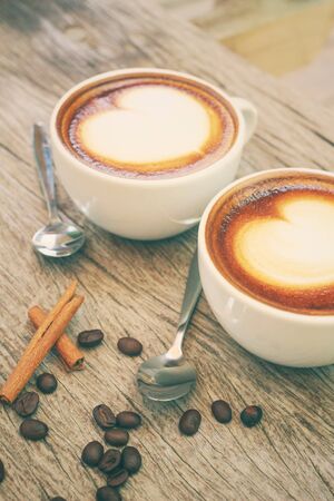 Two cups of latte art coffeeの写真素材