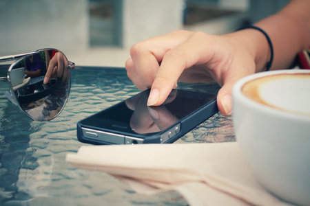 Latte coffee with smart phone