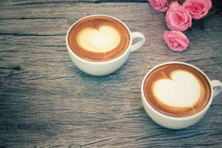 Two cups of latte art coffeeの写真素材