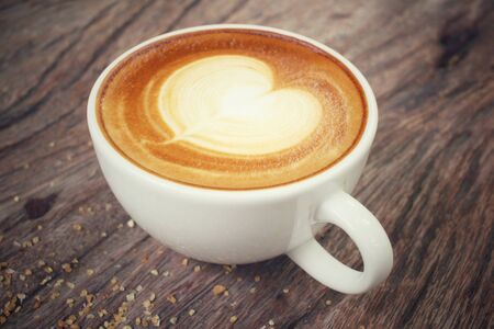 Vintage latte art coffeeの写真素材