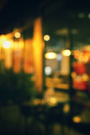 Blurred of restaurant at nightの写真素材