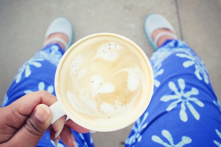 Selfie of coffee with shoesの写真素材