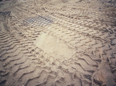 Wheel tracks on the soil.の写真素材
