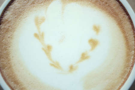 Vintage latte art coffeeの写真素材