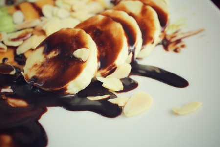 Banana with chocolate sauceの写真素材