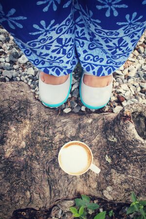 Selfie of coffee with shoesの写真素材