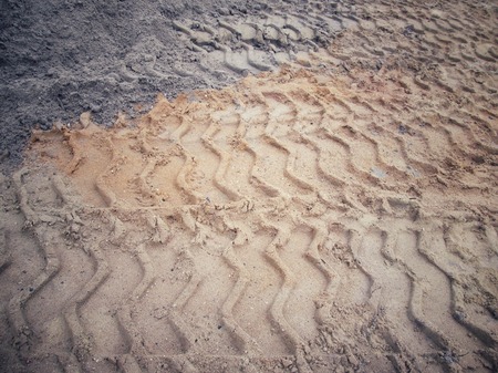 Wheel tracks on the soil.の写真素材
