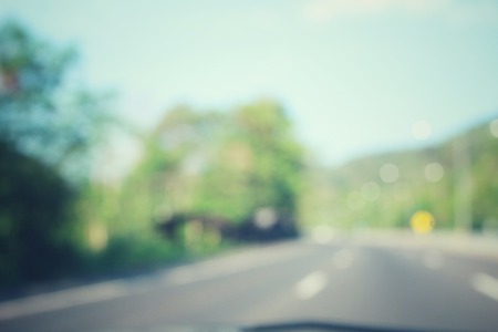 Blurred of road with treesの写真素材