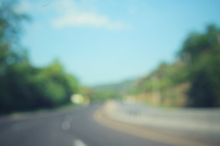 Blurred of road with treesの写真素材