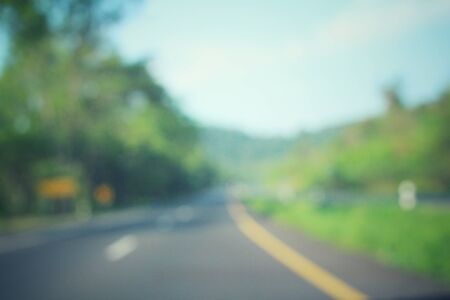 Blurred of road with treesの写真素材