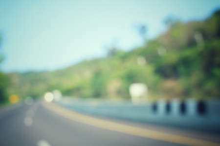 Blurred of road with treesの写真素材