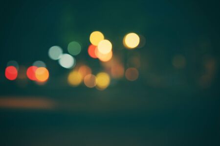 Blurred of car in city at nightの写真素材