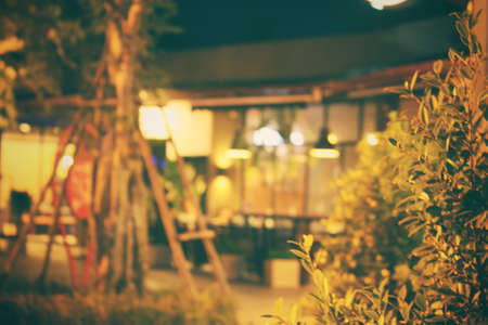 Blurred of restaurant at nightの写真素材