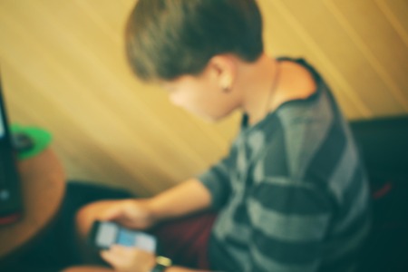 Blurred of using smart phoneの写真素材