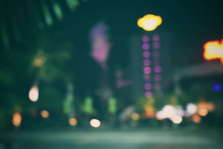 Blurred of car in city at nightの写真素材