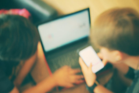 Blurred of playing on computer notebook