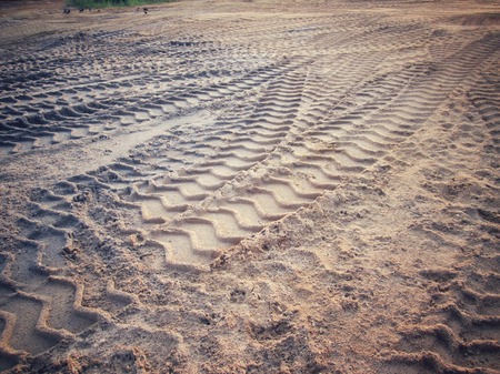 Wheel tracks on the soil.の写真素材