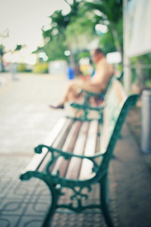 Blurred of bench chair in the parkの写真素材