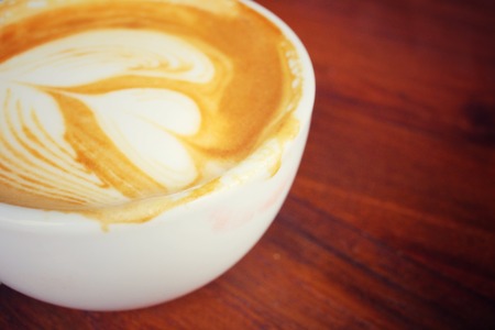 Vintage latte art coffeeの写真素材