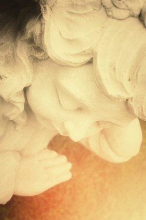 Vintage cupid sculpture