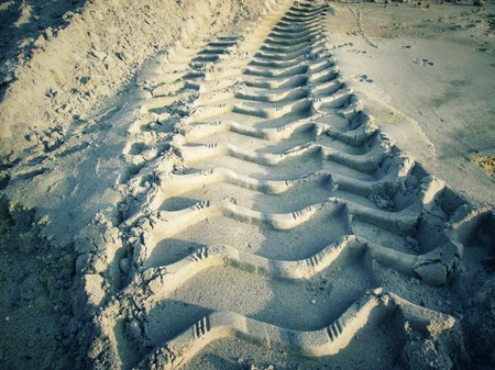 Wheel tracks on the soil.の写真素材